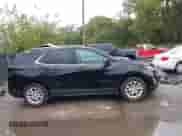 2018 Chevrolet Equinox LT z VIN 2GNAXJEV0J6142715, wystawiony jako IAAI lot #43262312 z przebiegiem 57 864 mil mil oraz . Historia ofert i sprzedaży dostępna na DreamBid. Obrazek 14.