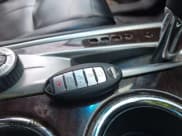 ✅ 2015 Nissan Pathfinder Platinum • VIN: 5N1AR2MM1FC648968 • Lot: 42953732. Listed on IAAI with 134,729 mi. Free auction sales archive from the USA and detailed vehicle history report at DreamBid. Image 11.