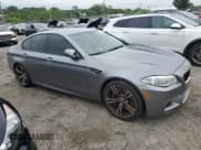 ✅ 2014 BMW M5 • VIN: WBSFV9C52ED593120 • Lot: 64427394. Wystawiony na Copart z przebiegiem 80 546 mil. Bezpłatny archiwum sprzedaży aukcyjnych z USA i szczegółowy raport historii pojazdu na DreamBid. Zdjęcie 4.
