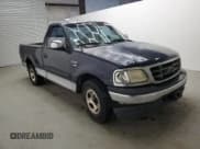 ✅ 2000 Ford F-150 XL • VIN: 1FTRF17L1YNA61061 • Lot: 87430655. Listed on Copart with 274,470 mi. Free auction sales archive from the USA and detailed vehicle history report at DreamBid. Image 4.