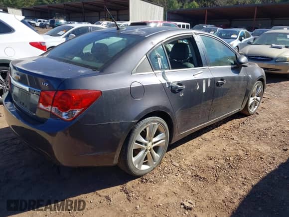 2011 Chevrolet Cruze LTZ с VIN 1G1PH5S9XB7176332, выставлен на аукционе IAAI как лот 43601161 с пробегом 165 185 миль миль и . История ставок и продаж доступна на DreamBid. Изображение 4.
