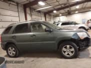 ✅ 2010 Kia Sportage LX • VIN: KNDKGCA38A7669401 • Lot: 43735724. Wystawiony na IAAI z przebiegiem 151 886 mil. Bezpłatny archiwum sprzedaży aukcyjnych z USA i szczegółowy raport historii pojazdu na DreamBid. Zdjęcie 13.