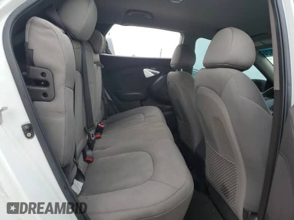 2014 Hyundai Tucson GLS z VIN KM8JT3AF8EU817843, wystawiony jako Copart lot #72648824 z przebiegiem 119 134 mil mil oraz Szkoda całkowita • Salvage title. Historia ofert i sprzedaży dostępna na DreamBid. Obrazek 11.