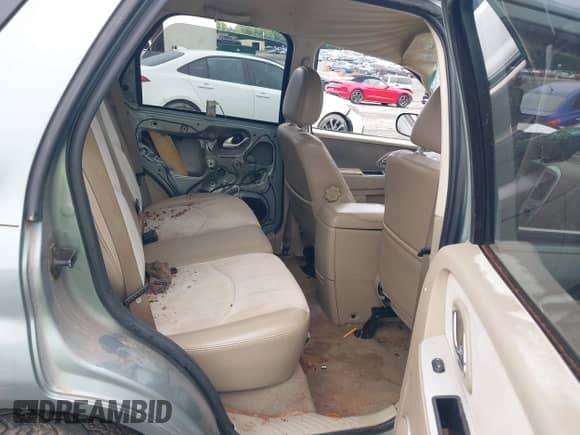 2006 Mercury Mariner Luxury with VIN 4M2YU57196KJ01063, listed as a IAAI auction lot 42907986 with Not provided miles and . Bid and sale history available at DreamBid. Image 8.