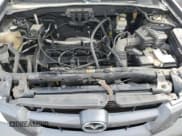 ✅ 2005 Mazda Tribute i • VIN: 4F2YZ02Z85KM63343 • Lot: 80834015. Listed on Copart with 223,893 mi. Free auction sales archive from the USA and detailed vehicle history report at DreamBid. Image 12.