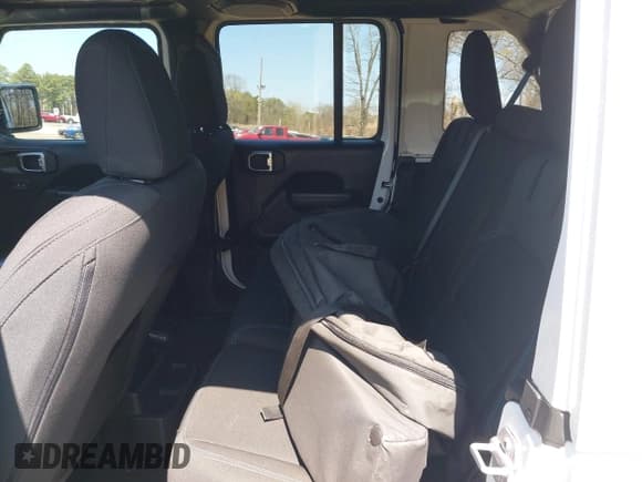 ✅ 2023 Jeep Wrangler Rubicon • VIN: 1C4JJXR68PW584303 • Лот: 42049098. Опубликован ранее на IAAI с пробегом 29 565 миль. Бесплатный доступ к архиву аукционных продаж из США и подробный отчёт об истории автомобиля на DreamBid. Изображение 8.