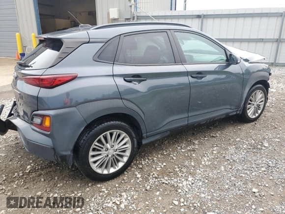 ✅ 2021 Hyundai Kona SEL • VIN: KM8K22AA7MU706642 • Лот: 64498245. Опубликован ранее на Copart с пробегом 99 999 миль. Бесплатный доступ к архиву аукционных продаж из США и подробный отчёт об истории автомобиля на DreamBid. Изображение 3.