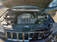 ✅ 2014 Jeep Grand Cherokee Overland • VIN: 1C4RJFCT8EC106019 • Lot: 90613555. Listed on Copart with 169,091 mi. Free auction sales archive from the USA and detailed vehicle history report at DreamBid. Image 12.