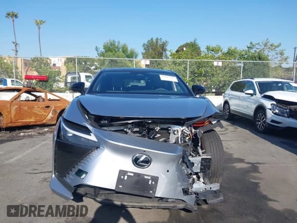 ✅ 2024 Lexus RZ 300e Premium • VIN: JTJABABBXRA003009 • Lot: 42297557. Listed on IAAI with 10,092 mi. Free auction sales archive from the USA and detailed vehicle history report at DreamBid. Image 12.
