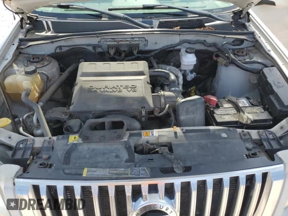 ✅ 2009 Mercury Mariner Premier • VIN: 4M2CU97G09KJ01723 • Lot: 61134475. Wystawiony na Copart z przebiegiem 105 205 mil. Bezpłatny archiwum sprzedaży aukcyjnych z USA i szczegółowy raport historii pojazdu na DreamBid. Zdjęcie 12.