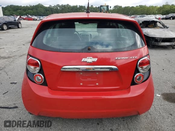 ✅ 2012 Chevrolet Sonic LTZ • VIN: 1G1JE6SH7C4162547 • Lot: 59697225. Listed on Copart with 112,332 mi. Free auction sales archive from the USA and detailed vehicle history report at DreamBid. Image 6.