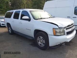 2011 Chevrolet Suburban LT z VIN 1GNSKJE37BR136546, wystawiony jako IAAI lot #43222783 z przebiegiem 171 295 mil mil oraz . Historia ofert i sprzedaży dostępna na DreamBid. Obrazek 1.