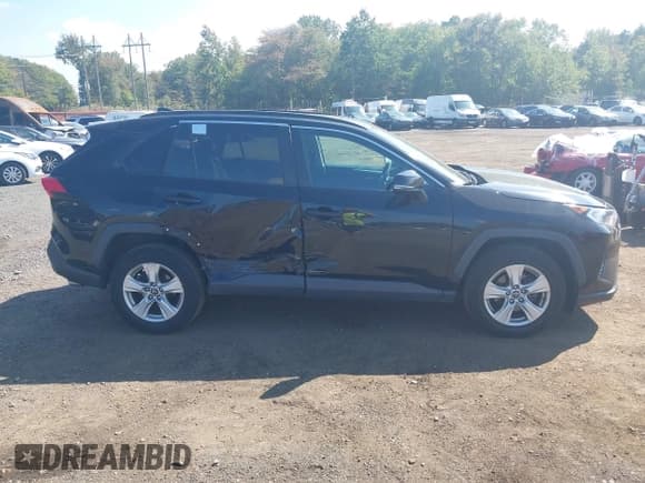 ✅ 2019 Toyota RAV4 XLE • VIN: 2T3W1RFV3KW012477 • Лот: 43271739. Опубликован ранее на IAAI с пробегом 188 136 миль. Бесплатный доступ к архиву аукционных продаж из США и подробный отчёт об истории автомобиля на DreamBid. Изображение 13.