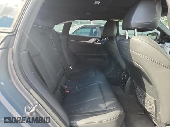 ✅ 2024 BMW i4 eDrive35 • VIN: WBY43AW05RFR51406 • Лот: 83773395. Опубликован ранее на Copart с пробегом 19 458 миль. Бесплатный доступ к архиву аукционных продаж из США и подробный отчёт об истории автомобиля на DreamBid. Изображение 10.