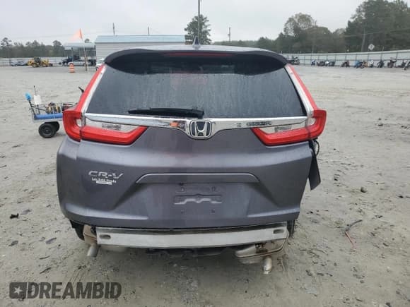 ✅ 2018 Honda CR-V EX-L • VIN: 7FARW1H89JE034645 • Лот: 90441835. Опубликован ранее на Copart с пробегом 70 510 миль. Бесплатный доступ к архиву аукционных продаж из США и подробный отчёт об истории автомобиля на DreamBid. Изображение 6.