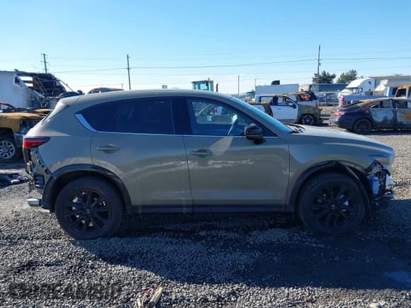 ✅ 2025 Mazda CX-5 Carbon Edition • VIN: JM3KFBAY0S0575930 • Lot: 41539941. Wystawiony na IAAI z przebiegiem 1 847 mil. Bezpłatny archiwum sprzedaży aukcyjnych z USA i szczegółowy raport historii pojazdu na DreamBid. Zdjęcie 14.