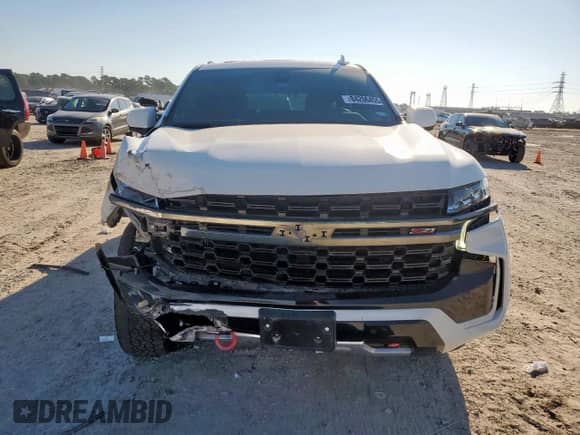 2022 Chevrolet Tahoe Z71 with VIN 1GNSKPKD4NR100687, listed as a Copart auction lot 84206455 with 63,741 mi miles and Salvage title. Bid and sale history available at DreamBid. Image 5.