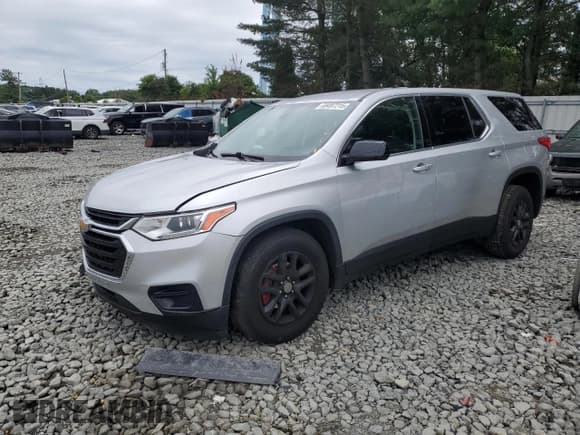 ✅ 2020 Chevrolet Traverse LS • VIN: 1GNERLKW7LJ163393 • Lot: 69497215. Listed on Copart with 103,250 mi. Free auction sales archive from the USA and detailed vehicle history report at DreamBid. Image 1.