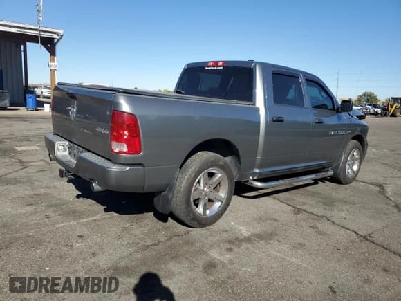 ✅ 2012 Ram 1500 Express • VIN: 1C6RD7KT7CS142423 • Lot: 82673575. Listed on Copart with 131,199 mi. Free auction sales archive from the USA and detailed vehicle history report at DreamBid. Image 3.