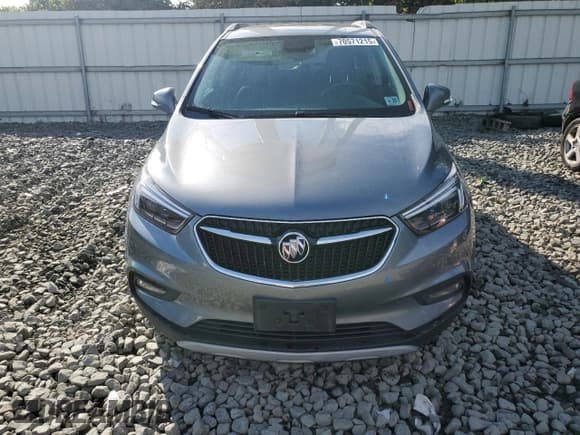 ✅ 2020 Buick Encore Essence • VIN: KL4CJCSBXLB032130 • Lot: 70571215. Listed on Copart with 77,365 mi. Free auction sales archive from the USA and detailed vehicle history report at DreamBid. Image 5.