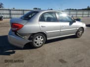 ✅ 2005 Kia Rio • VIN: KNADC125956382747 • Lot: 82539335. Listed on Copart with 166,122 mi. Free auction sales archive from the USA and detailed vehicle history report at DreamBid. Image 3.