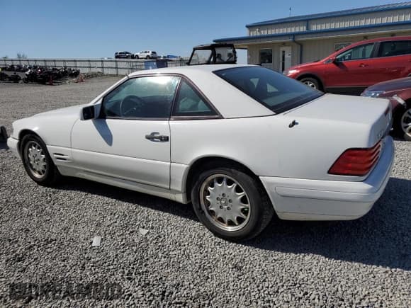 ✅ 1996 Mercedes-Benz SL 500 • VIN: WDBFA67F9TF131853 • Лот: 53139405. Опубликован ранее на Copart с пробегом 93 028 миль. Бесплатный доступ к архиву аукционных продаж из США и подробный отчёт об истории автомобиля на DreamBid. Изображение 2.