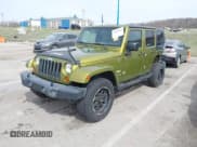 ✅ 2007 Jeep Wrangler Unlimited Sahara • VIN: 1J8GA59167L161894 • Lot: 41856064. Listed on IAAI with 122,714 mi. Free auction sales archive from the USA and detailed vehicle history report at DreamBid. Image 2.
