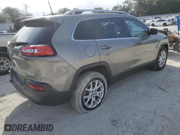 ✅ 2016 Jeep Cherokee Latitude • VIN: 1C4PJMCB8GW296554 • Lot: 84764875. Listed on Copart with 64,170 mi. Free auction sales archive from the USA and detailed vehicle history report at DreamBid. Image 3.