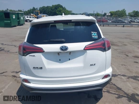✅ 2018 Toyota RAV4 XLE • VIN: 2T3WFREV1JW459553 • Lot: 42423474. Listed on IAAI with 129,523 mi. Free auction sales archive from the USA and detailed vehicle history report at DreamBid. Image 16.