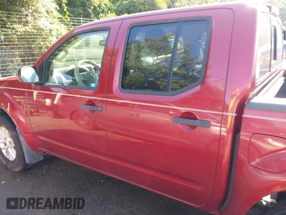 ✅ 2015 Nissan Frontier Pro-4X • VIN: 1N6AD0EV9FN706700 • Lot: 42840345. Listed on IAAI with 254,692 mi. Free auction sales archive from the USA and detailed vehicle history report at DreamBid. Image 14.