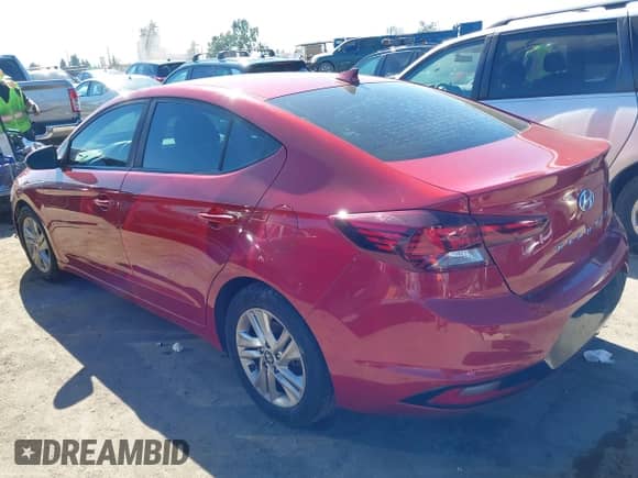2019 Hyundai Elantra SEL z VIN KMHD84LF9KU782677, wystawiony jako IAAI lot #43588740 z przebiegiem 129 833 mil mil oraz . Historia ofert i sprzedaży dostępna na DreamBid. Obrazek 3.