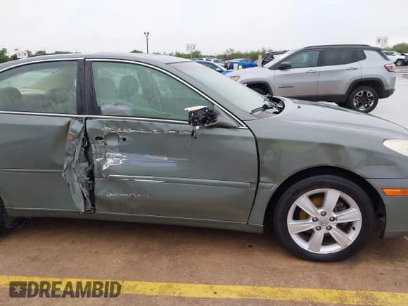 ✅ 2005 Lexus ES 350 • VIN: JTHBA30G755063805 • Lot: 42376576. Listed on IAAI with 209,524 mi. Free auction sales archive from the USA and detailed vehicle history report at DreamBid. Image 6.