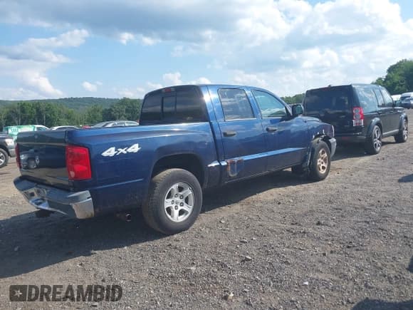✅ 2005 Dodge Dakota SLT • VIN: 1D7HW48N05S227232 • Lot: 42816124. Listed on IAAI with 187,080 mi. Free auction sales archive from the USA and detailed vehicle history report at DreamBid. Image 4.