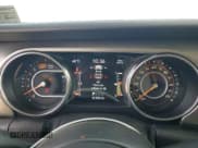 ✅ 2019 Jeep Wrangler Unlimited Sahara • VIN: 1C4HJXEN3KW591387 • Лот: 84726835. Опубликован ранее на Copart с пробегом 51 703 миль. Бесплатный доступ к архиву аукционных продаж из США и подробный отчёт об истории автомобиля на DreamBid. Изображение 9.