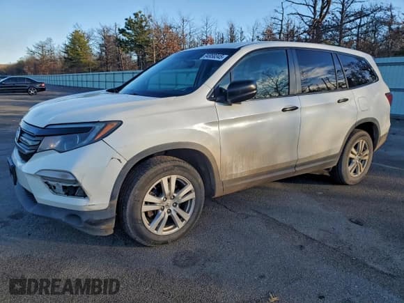 ✅ 2017 Honda Pilot LX • VIN: 5FNYF6H1XHB032601 • Lot: 94958345. Listed on Copart with 213,237 mi. Free auction sales archive from the USA and detailed vehicle history report at DreamBid. Image 1.