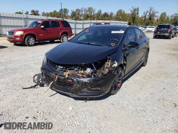 2018 Chevrolet Cruze LT z VIN 1G1BE5SM3J7177585, wystawiony jako Copart lot #64793912 z przebiegiem Nie podano mil oraz . Historia ofert i sprzedaży dostępna na DreamBid. Obrazek 2.