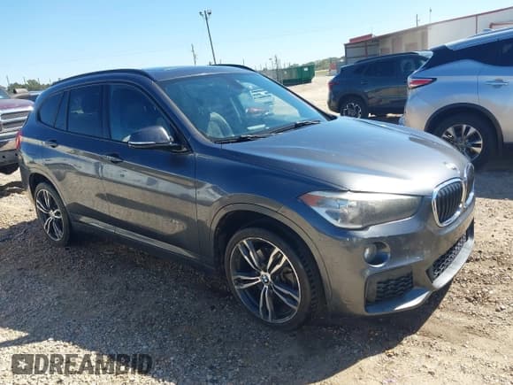 ✅ 2018 BMW X1 sDrive28i • VIN: WBXHU7C33J5H38892 • Лот: 43510586. Опубликован ранее на IAAI с пробегом 186 277 миль. Бесплатный доступ к архиву аукционных продаж из США и подробный отчёт об истории автомобиля на DreamBid. Изображение 1.