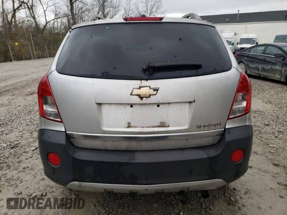 2014 Chevrolet Captiva Sport LS z VIN 3GNAL2EK6ES674243, wystawiony jako Copart lot #81742154 z przebiegiem 185 254 mil mil oraz Czysty tytuł • Clean title. Historia ofert i sprzedaży dostępna na DreamBid. Obrazek 6.