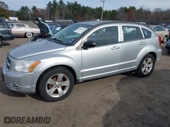 ✅ 2010 Dodge Caliber SXT • VIN: 1B3CB4HA6AD652113 • Lot: 43630335. Listed on IAAI with 141,686 mi. Free auction sales archive from the USA and detailed vehicle history report at DreamBid. Image 6.
