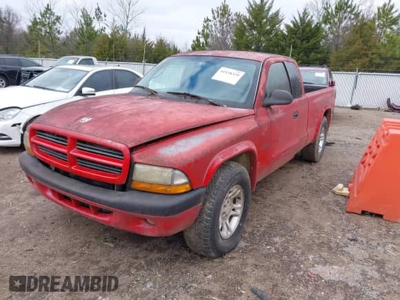 2002 Dodge Dakota Sport z VIN 1B7GL32XX2S558947, wystawiony jako IAAI lot #41538339 z przebiegiem 126 150 mil mil oraz . Historia ofert i sprzedaży dostępna na DreamBid. Obrazek 2.