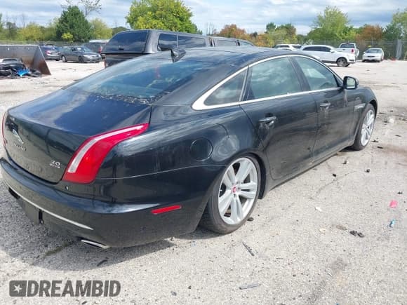 ✅ 2017 Jaguar XJ Portfolio • VIN: SAJWJ2GD4H8W04869 • Lot: 43280185. Listed on IAAI with 77,517 mi. Free auction sales archive from the USA and detailed vehicle history report at DreamBid. Image 4.