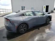 ✅ 2023 Toyota Prius LE • VIN: JTDACAAU1P3004571 • Лот: 57877853. Опубликован ранее на Copart с пробегом 8 760 миль. Бесплатный доступ к архиву аукционных продаж из США и подробный отчёт об истории автомобиля на DreamBid. Изображение 3.