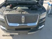 ✅ 2021 Lincoln Navigator Black Label • VIN: 5LMJJ3TT3MEL17149 • Лот: 56899515. Опубликован ранее на Copart с пробегом 50 272 миль. Бесплатный доступ к архиву аукционных продаж из США и подробный отчёт об истории автомобиля на DreamBid. Изображение 16.