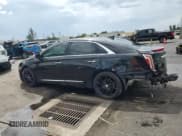 ✅ 2016 Cadillac XTS Premium Collection • VIN: 2G61P5S37G9134785 • Lot: 80184655. Wystawiony na Copart z przebiegiem 131 661 mil. Bezpłatny archiwum sprzedaży aukcyjnych z USA i szczegółowy raport historii pojazdu na DreamBid. Zdjęcie 2.