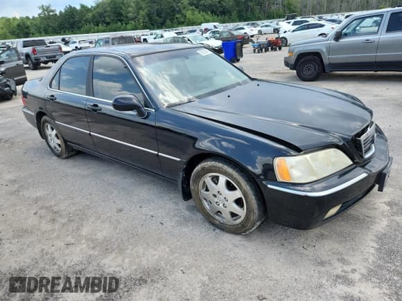 ✅ 2002 Acura RL • VIN: JH4KA96612C006332 • Lot: 63275415. Listed on Copart with Not provided. Free auction sales archive from the USA and detailed vehicle history report at DreamBid. Image 4.