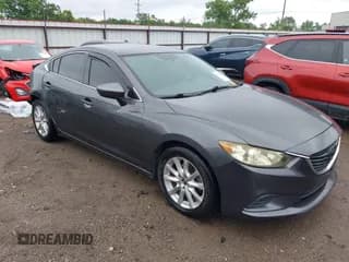 ✅ 2015 Mazda 6 i Sport • VIN: JM1GJ1U64F1166301 • Lot: 42322328. Listed on IAAI with 209,284 mi. Free auction sales archive from the USA and detailed vehicle history report at DreamBid. Image 1.