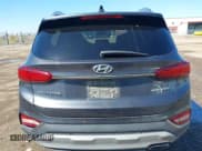 ✅ 2020 Hyundai Santa Fe Limited • VIN: 5NMS5CAA0LH208063 • Лот: 42131296. Опубликован ранее на IAAI с пробегом 65 030 миль. Бесплатный доступ к архиву аукционных продаж из США и подробный отчёт об истории автомобиля на DreamBid. Изображение 16.
