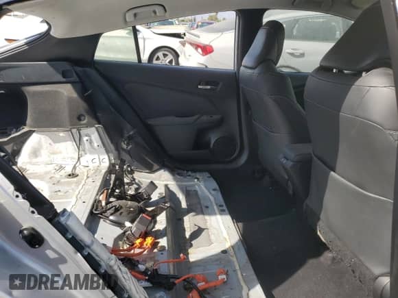 2022 Toyota Prius LE с VIN JTDKAMFP7N3228892, выставлен на аукционе Copart как лот 69565485 с пробегом 23 576 миль миль и Списание • Salvage title. История ставок и продаж доступна на DreamBid. Изображение 10.