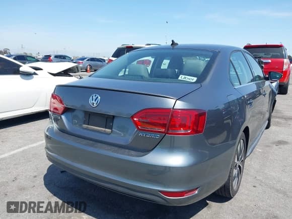 ✅ 2013 Volkswagen Jetta Hybrid SE • VIN: 3VW637AJ1DM232687 • Лот: 41973407. Опубликован ранее на IAAI с пробегом 70 428 миль. Бесплатный доступ к архиву аукционных продаж из США и подробный отчёт об истории автомобиля на DreamBid. Изображение 4.