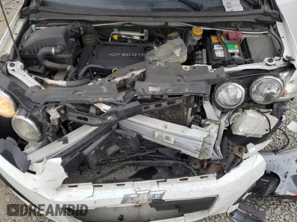 ✅ 2014 Chevrolet Sonic LS • VIN: 1G1JA6SGXE4197654 • Lot: 92868875. Listed on Copart with 115,903 mi. Free auction sales archive from the USA and detailed vehicle history report at DreamBid. Image 11.